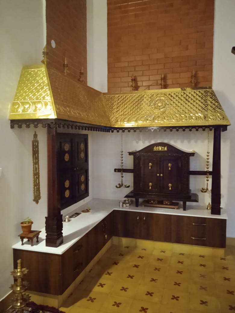 Chettinadu style pooja unit with gold foil roof