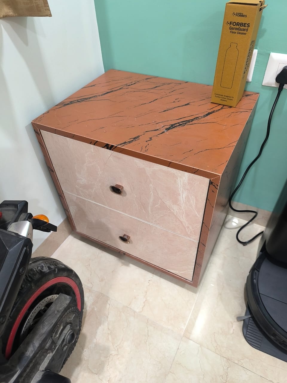 Bedside table with rose marble finish